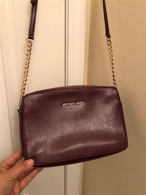 michael kors small messenger saddle bag|Michael Kors burgundy crossbody bag.